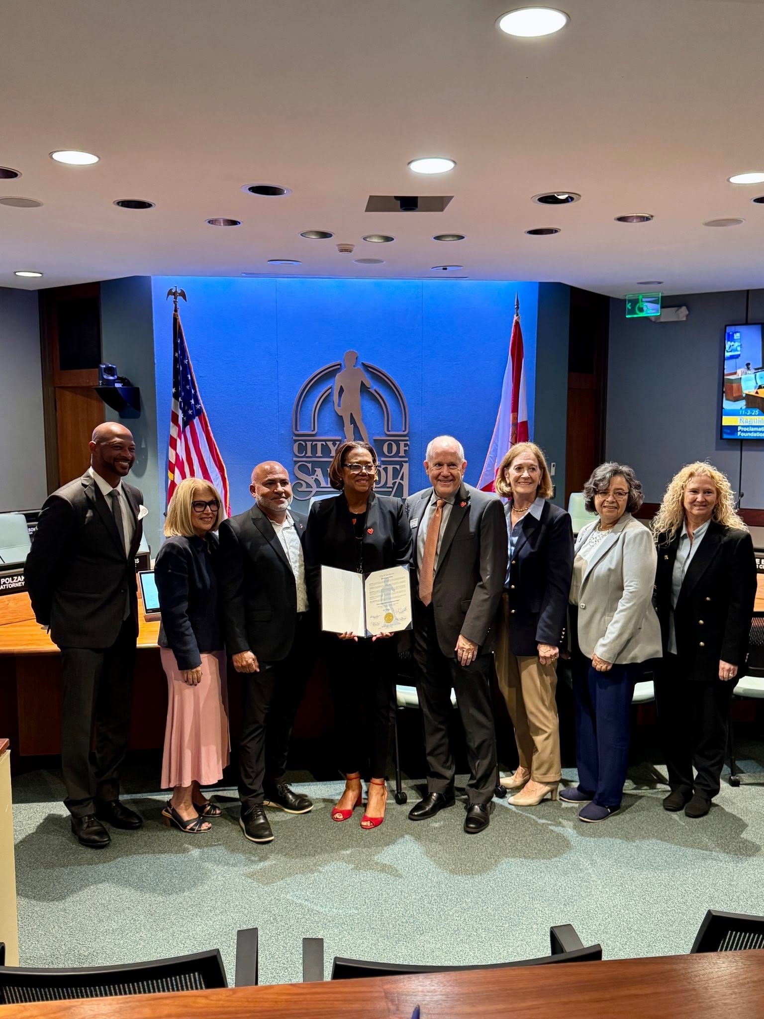 Susan Terry Foundation representatives receiving a proclamation from the City of Sarasota