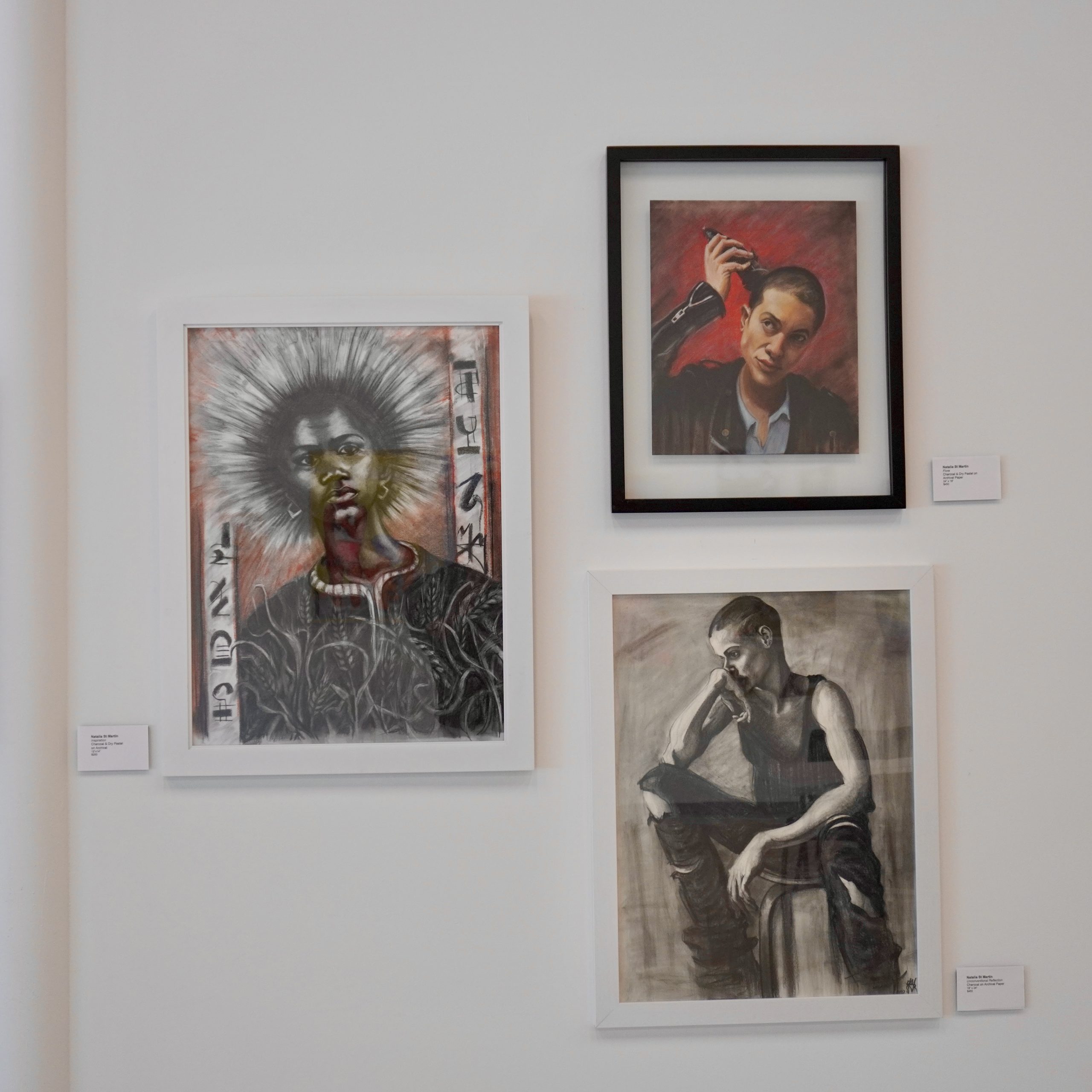 Artwork displayed inside a gallery setting.