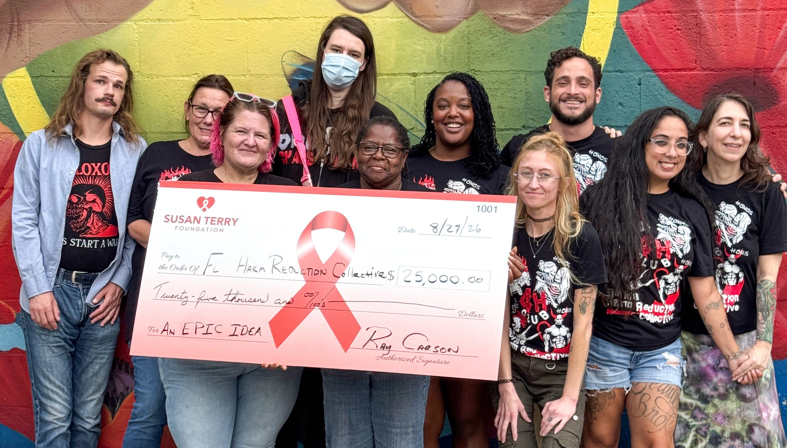 Florida Harm Reduction Collective representatives at a Susan Terry Foundation grant check presentation.